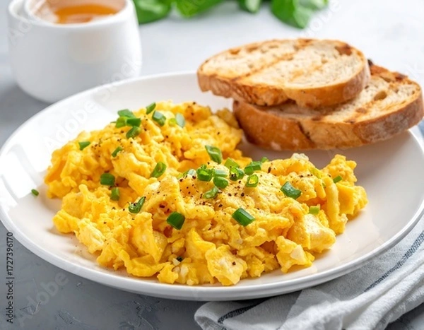 Obraz Scrambled eggs with toast