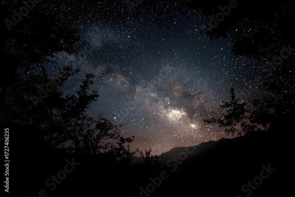 Obraz Milky Way over dark mountains