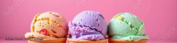 Fototapeta Three scoops of colorful gelato in pink background, delicious, frozen