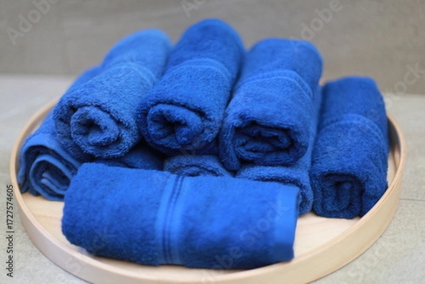 Fototapeta blue towel roll on tray, for spa or exercise