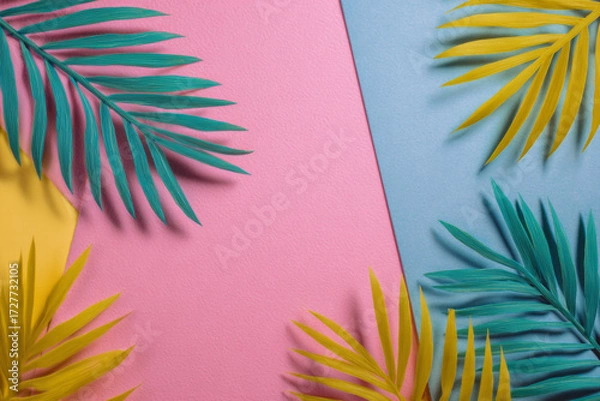 Obraz Colorful tropical leaves on pink, blue and yellow background in studio shot