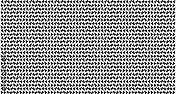 Fototapeta A dense, repeating pattern of small, dark, abstract shapes on a white background, creating a textured visual effect.