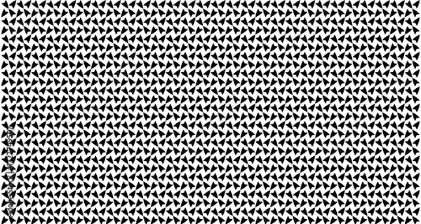 Fototapeta A dense, repeating pattern of small black triangles arranged in rows, creating a textured visual effect.