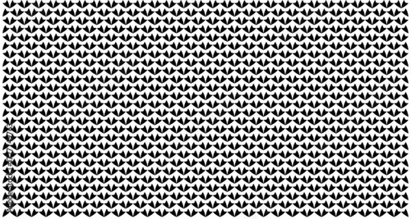 Fototapeta Monochromatic repeating pattern of small, dark, arrow-like shapes creating a dense, textured background.