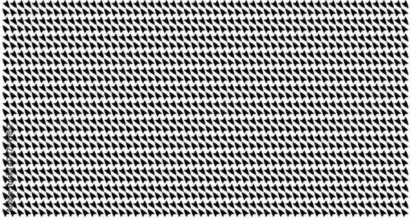 Fototapeta A dense, repeating pattern of small black triangles arranged in rows, creating a textured visual effect.