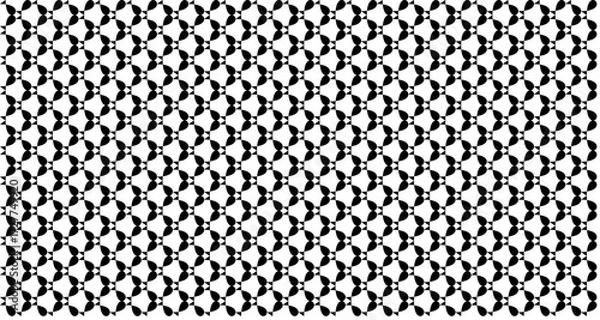 Fototapeta A seamless black and white abstract geometric pattern with repeating stylized shapes creating a textured, tessellated background.