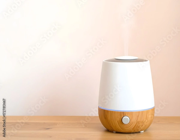 Fototapeta Modern Essential Oil Diffuser with Bamboo Base and Gentle Steam