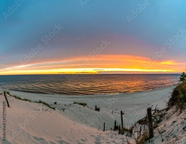 Obraz Panoramic sunset over a beach with dunes