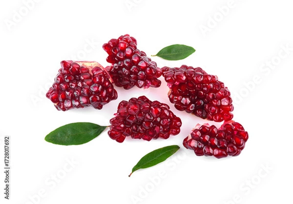 Fototapeta pomegranate seeds on a white background