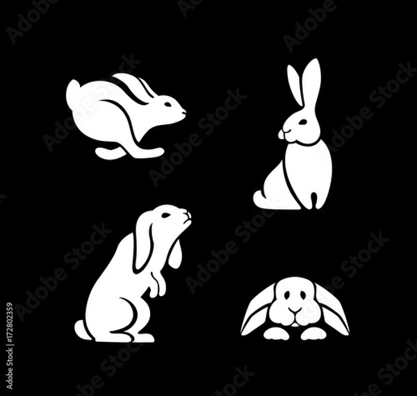 Fototapeta silhouettes of hares in different poses, the logo of a rabbit