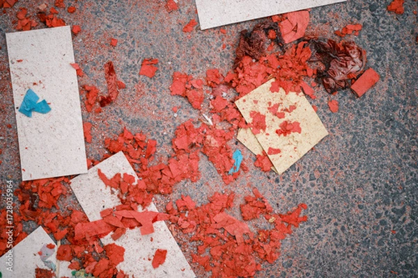 Fototapeta Firecracker debris scattered on street after festival in Taiwan Tamsui