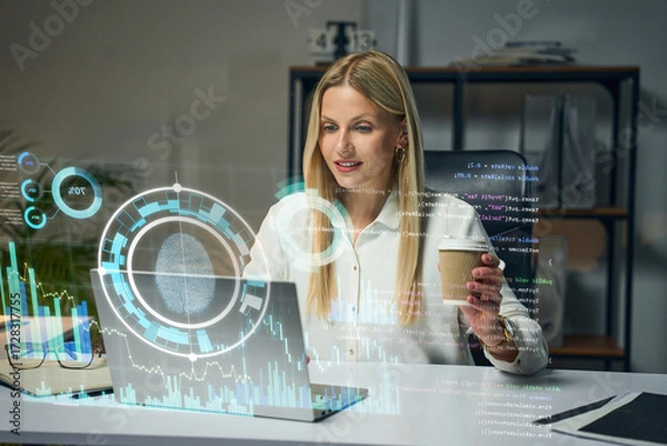 Fototapeta Businesswoman Analyzing Data With Holographic Interface In Modern Office, Coffee In Hand, Futuristic Visualization