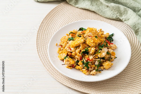 Obraz stir-fried egg with Thai basil and chilli