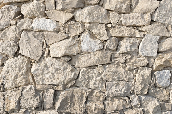 Fototapeta A photograph of a background of several stones