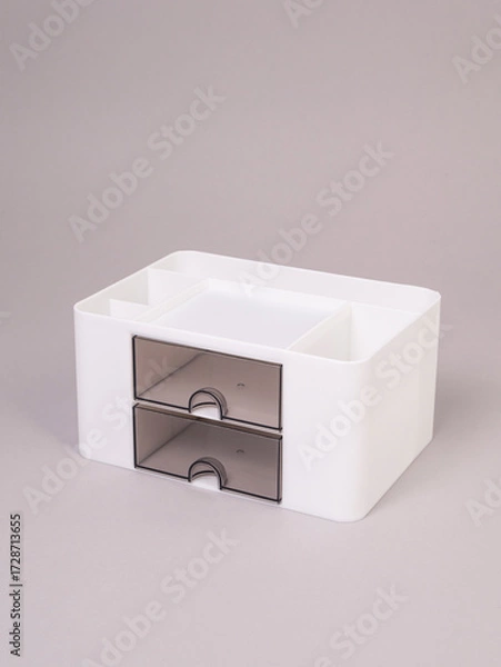 Obraz Empty white organizer for office supplies and cosmetics with two drawers on gray background