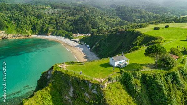 Fototapeta Aerial view of a Ermita de la Regalina on the steep cliffs in Asturias, Spain