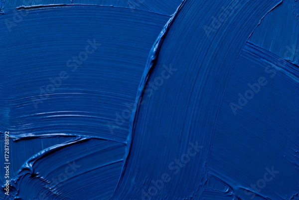 Fototapeta Close-up of blue paint strokes with textured brush marks
