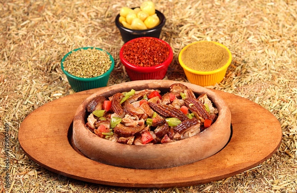 Obraz kokorech served mixed with vegetables and spices