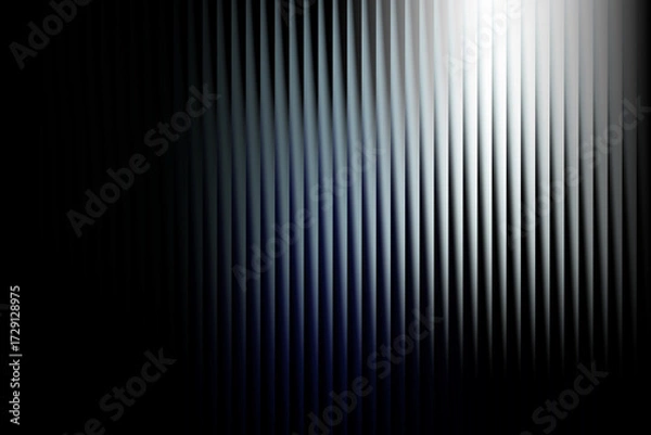 Fototapeta Abstract vertical lines with a gradient of blue and white light on a black background