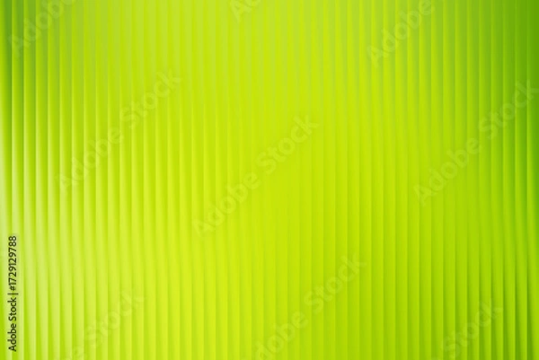 Fototapeta Vibrant lime green abstract background featuring a pattern of vertical lines with a soft, luminous glow