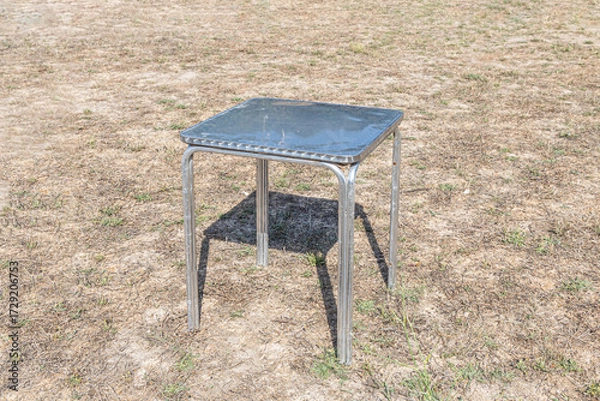 Obraz Metallic white table on the gray background