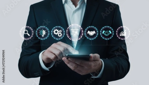 Fototapeta Smart Technology in Action: A professional in a smart suit effortlessly uses a sleek smartphone, seamlessly blending cutting-edge technology with modern business