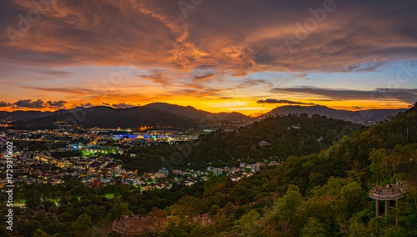 Fototapeta aerial view of Khao Rang viewpoint in sunset.
Khao Rang viewpoint tower landmark in Phuket town it is on Tung Ka hill.
on Khao Rang viewpoint can see around Phuket and watching sunrise and sunset