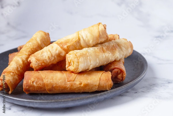 Obraz fried spring rolls with cheese, on a plate, with cream sauce, no people,
