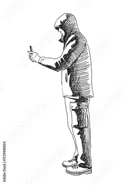 Fototapeta One young modern man photographing on smartphone, standing, jacket  hood, profile view, outdoors, realistic sketch, vector contour hand drawing, white background