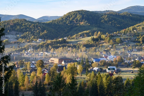 Fototapeta View of the village of Kosmach at dawning. Kosmach is a village located in the Carpathian Mountains, in Kosiv region, Ivano-Frankivsk Oblast, Ukraine. Autumn morning landscape.