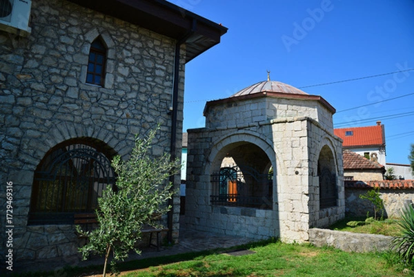 Fototapeta A view of the historic Haci Mehmet Osmangagic Mosque and Tomb in Podgorica, Montenegro.