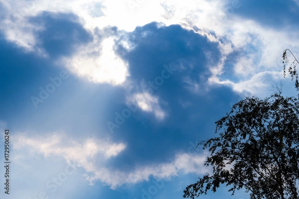 Obraz Clouds and blue sky with sun rays