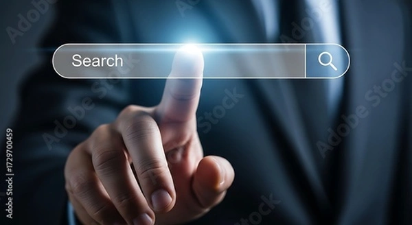 Fototapeta Person's finger pointing at a search bar on a digital screen interface internet online