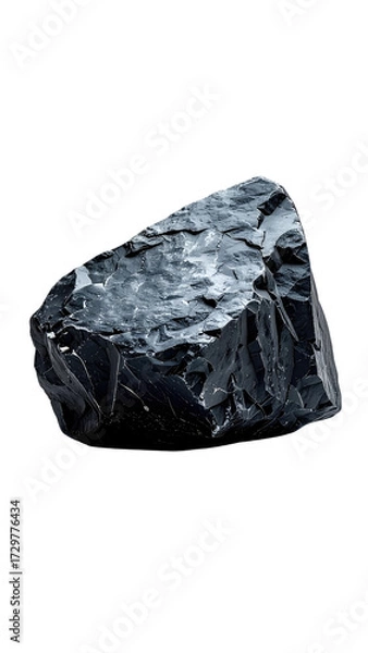 Fototapeta Dark, rough-edged, irregular-shaped chunk of mineral, against a stark black background.  Detailed surface texture