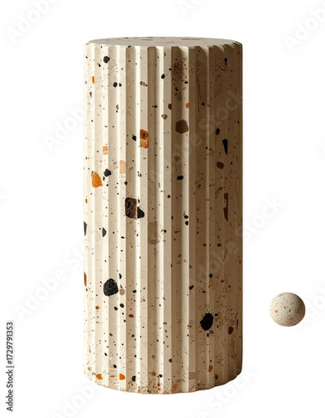 Fototapeta Off-white, fluted column-shaped object with speckled, colorful design.  A small, light sphere rests below
