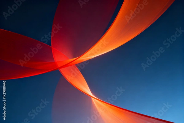 Fototapeta Abstract flowing red and orange ribbons against a deep blue background