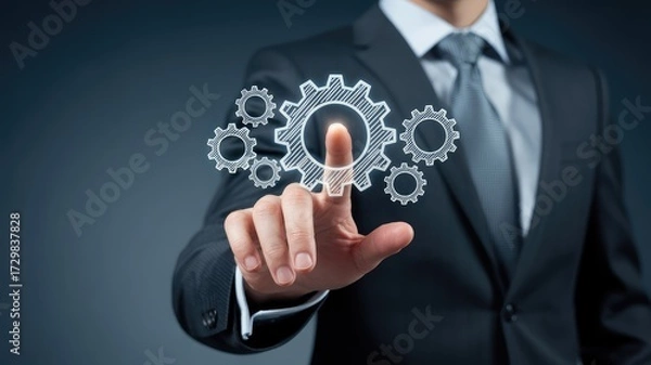 Fototapeta Businessman's finger activating gears, symbolizing innovation, technology, and business solutions