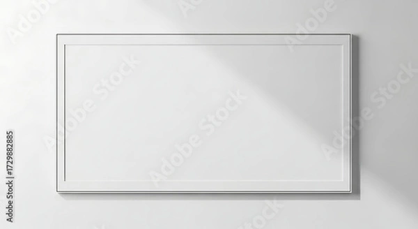 Fototapeta Minimalist White Frame Mockup on a Clean Wall with Natural Shadows