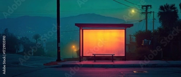 Fototapeta Modern urban bus stop shelter illuminated at night with sleek architecture outdoor lighting and scenic cityscape creating a safe and functional public transportation space