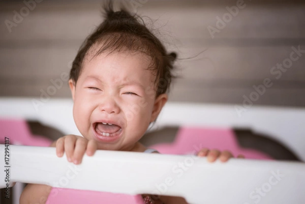 Obraz crying baby in bed