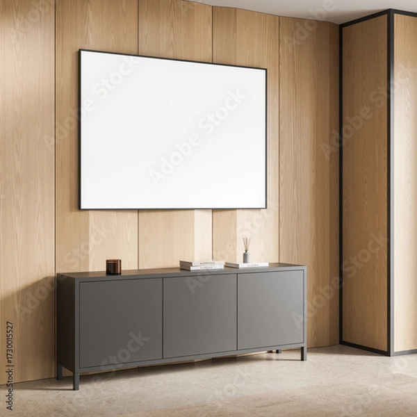 Fototapeta Modern poster mockup in minimalist interior with wooden panel wall and sleek gray cabinet decor for stylish architecture showcase concept. 3D Rendering