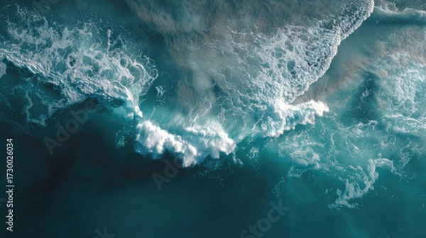 Fototapeta Aerial turquoise ocean waves crashing with white foam
