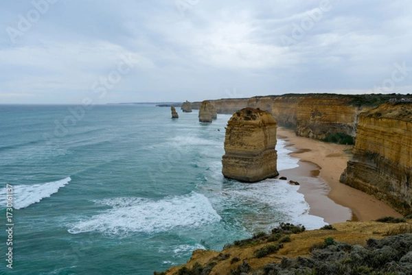 Obraz The Twelve Apostles limestone stacks along the Great Ocean Road in Victoria, Australia, a famous coastal landmark known for stunning cliffs, ocean views, and natural beauty.
