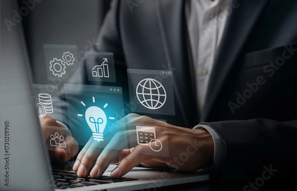 Obraz Business Strategy Icons in Digital Planning Interface, Laptop surrounded by glowing icons for innovation and teamwork