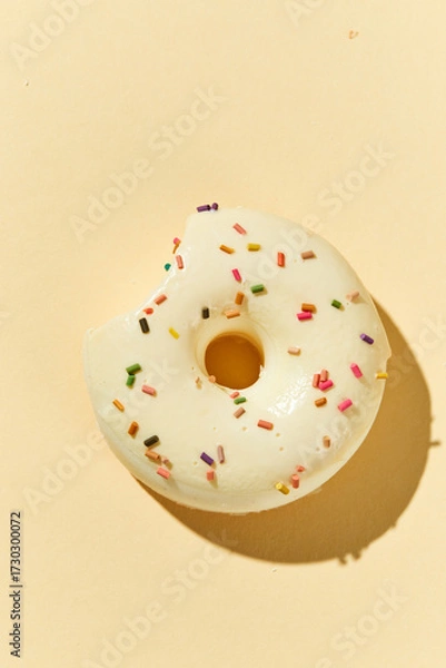 Fototapeta Overhead view of Delicious donut on colored background
