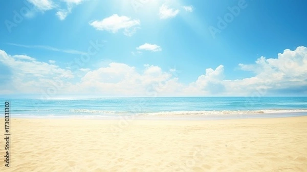Fototapeta Vast flat beach with soft sand, calm sea and clear blue sky, visible distant horizon adds depth, ideal for travel promotions, poster design and digital art projects.