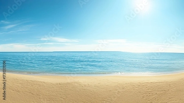 Fototapeta Vast flat beach with soft sand, calm sea and clear blue sky, visible distant horizon adds depth, ideal for travel promotions, poster design and digital art projects.