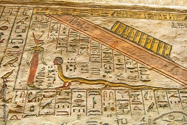 Fototapeta Hieroglyphic carvings in an ancient egyptian burial tomb