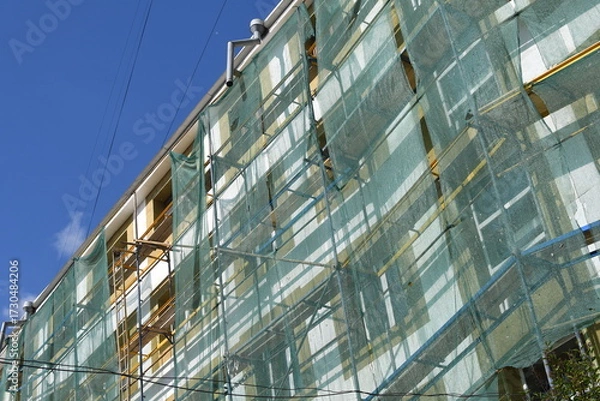 Fototapeta Insulating and repair works on residential building. Improving energy efficiency. 