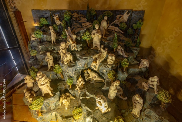 Fototapeta Nativity scene figures representing everyday life activities